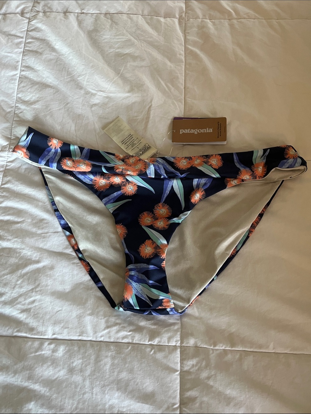 Patagonia Navy Floral Swim Bottoms with Orange Blooms